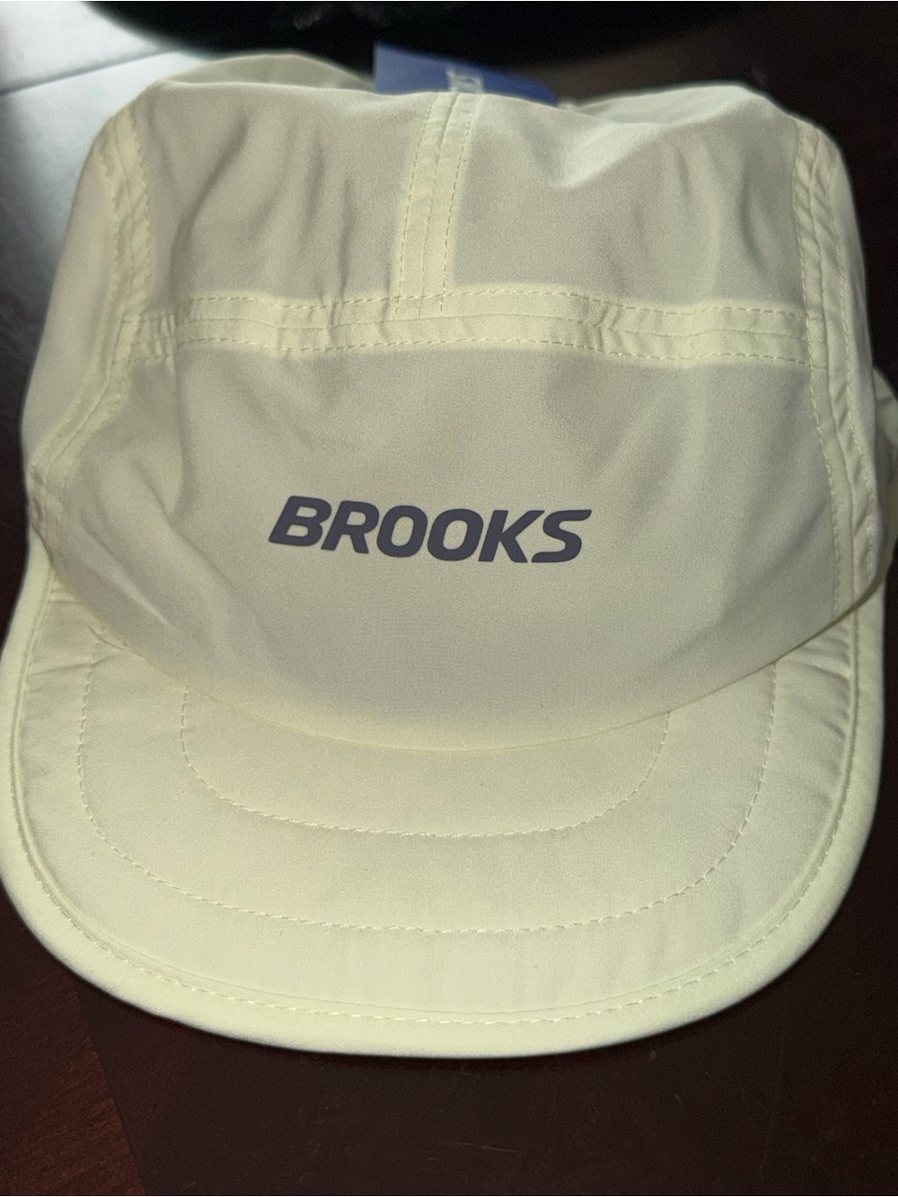Brooks Light Cream Performance Cap with Navy Logo